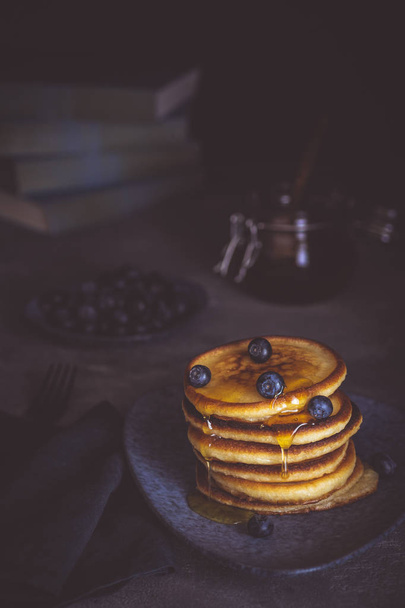 Pancakes with Fresh Berries and Maple Syrup on Dark Background. Classic American Homemade Breakfast. - Foto, Imagem
