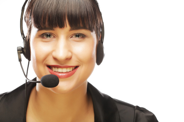 Closeup of female customer service representative smiling - Φωτογραφία, εικόνα