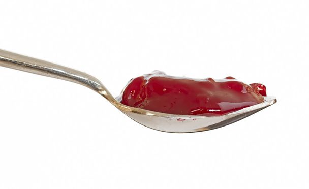 Cuchara de mermelada roja de frambuesa
 - Foto, imagen