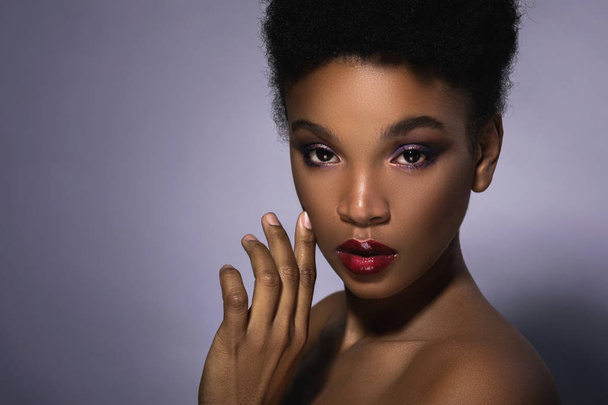Young African model with a beautiful makeup - Fotó, kép