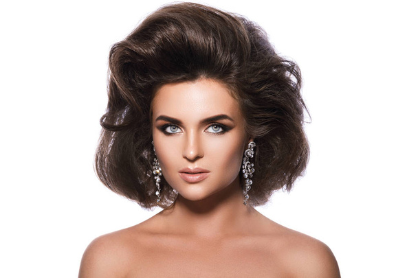 Gorgeous woman with a beautiful hairstyle and make-up - Фото, изображение