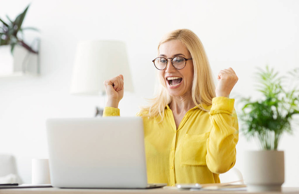 Happy Successful Businesswoman Triumphing With Laptop In Office - Photo, Image