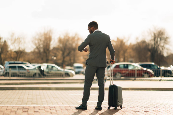 Airport Taxi. Businessman Waiting For Taxi Car - Photo, Image