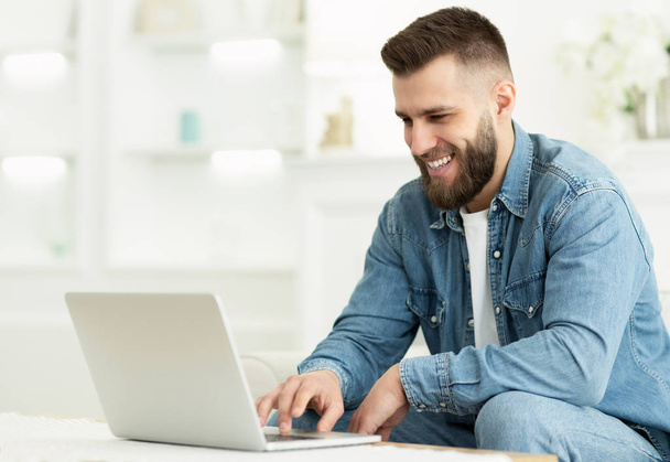 Freelancer Man Working On Laptop Online At Home - Photo, Image