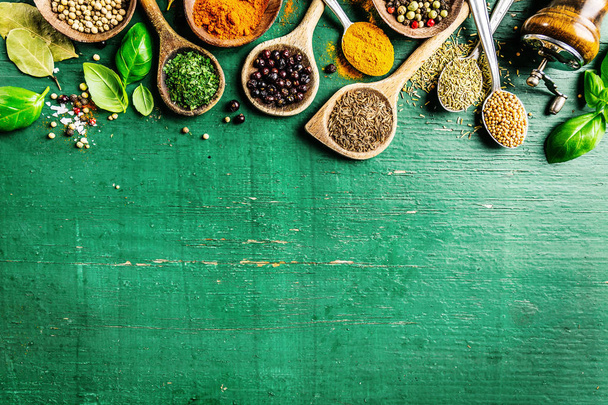 Spices and herbs on wooden background - Φωτογραφία, εικόνα