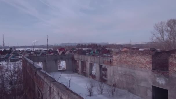 Flight over the abandoned building, Old destroyed building in a winter season. Aerial view 4K - Video, Çekim