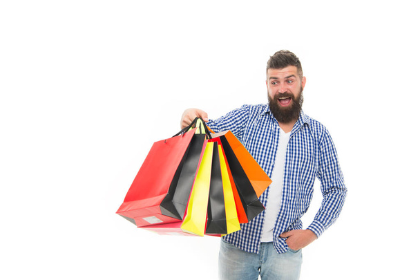 Consumer protection concept. Man happy consumer hold shopping bags. Buy and sell. Consumer protection laws ensure rights. Fair trade competition and accurate information in marketplace. Safe shopping - Фото, зображення