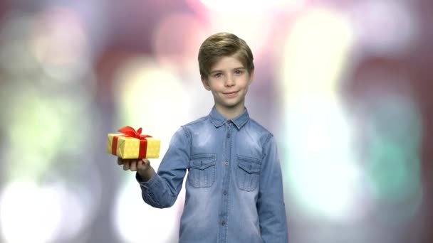 Portrait of lovely child holding gift box. - Footage, Video