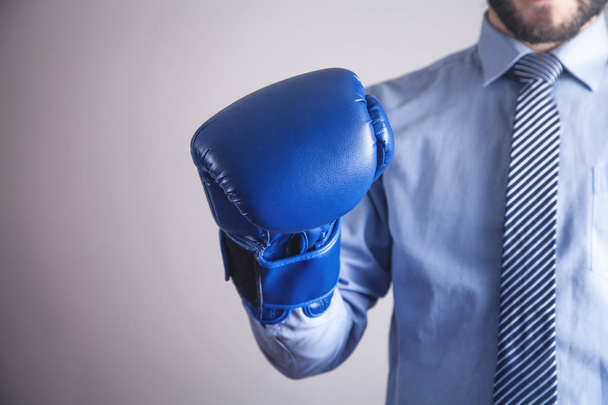 Businessman in boxing gloves. Business, Power, Sport - Foto, afbeelding