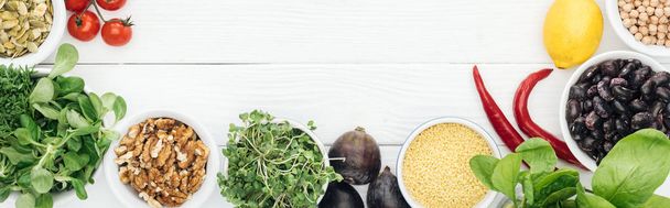 top view of ripe vegetables on wooden white table with copy space, panoramic shot - Photo, Image
