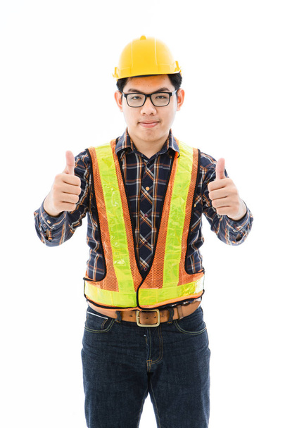 Engineer man cross arm orange helmet and vest - Φωτογραφία, εικόνα
