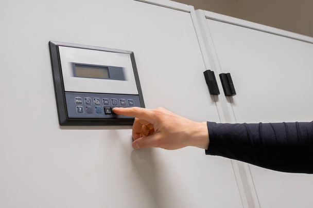Professional Engineer Adjusting Air Conditioner In Datacenter - Photo, image