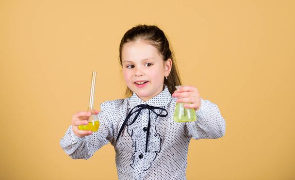 Focusing on work. child study bilogy lesson. science research in lab. Small school girl. back to school. small smart girl with testing flask. education and knowledge. Inspired to work hard - Zdjęcie, obraz