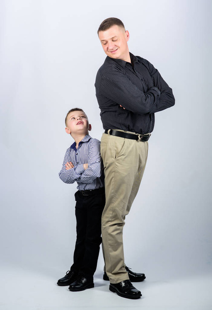 family day. happy child with father. business partner. father and son in business suit. childhood. parenting. fathers day. little boy with dad businessman. happy family day. happy family concept - Photo, image