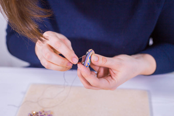 Designer making handmade brooch - Photo, Image