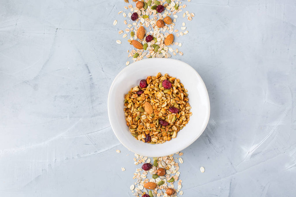 Homemade granola muesli with ingredients, healthy food for breakfast - Zdjęcie, obraz