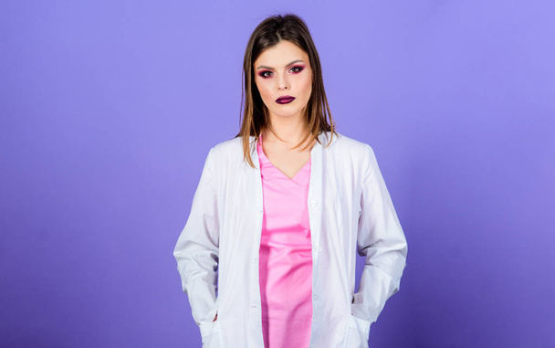 Woman pretty doctor wear white uniform. Girl makeup face professional doctor. Medical treatment recommendations. Prescribed by doctor. Health care. Medical education. Medicine concept. Private clinic - Φωτογραφία, εικόνα