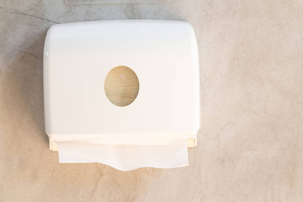 Tissues paper towel dispenser on the wall - Photo, Image