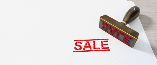red stamp sale on white paper background - Фото, изображение