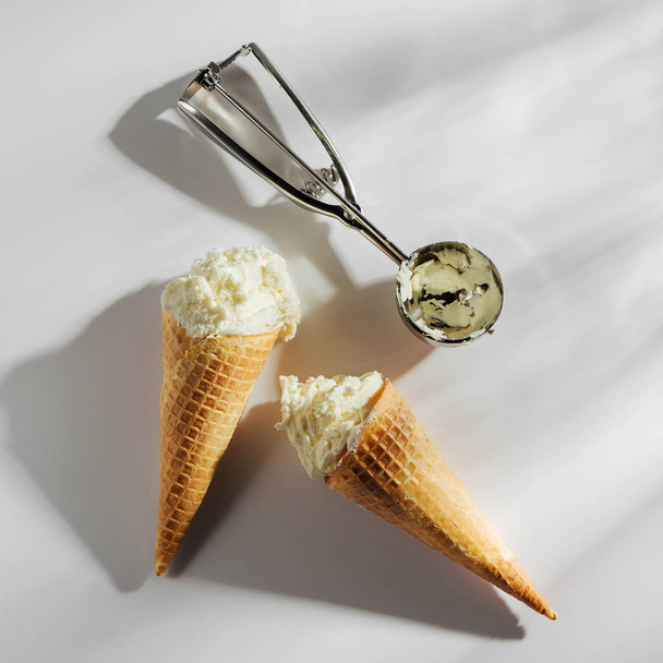 Ice cream cones with spoon on white background. Summer concept - Fotografie, Obrázek