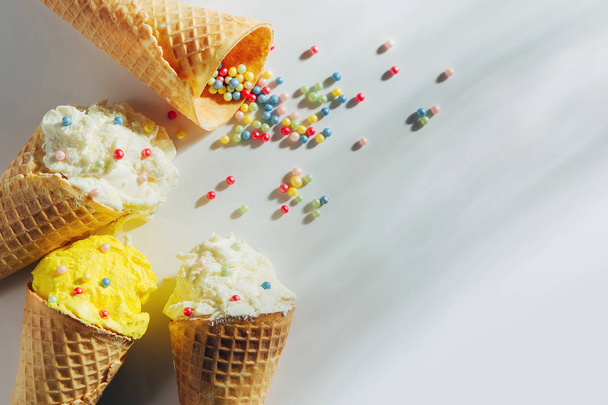 Ice cream cones on white background. Summer concept. - 写真・画像