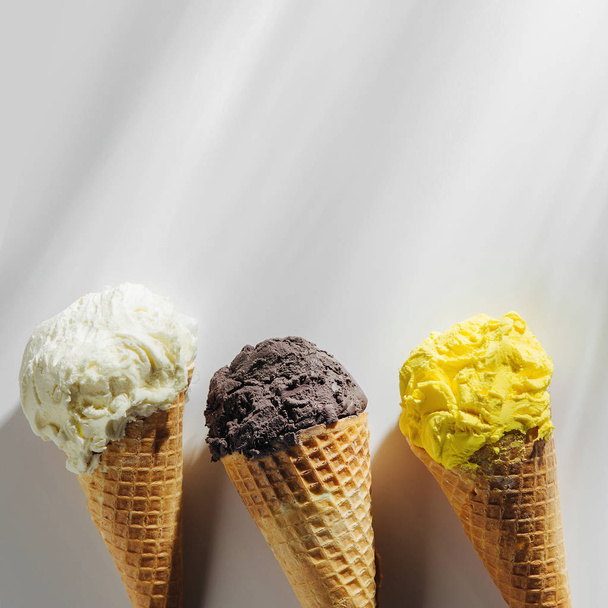 Ice cream cones on white background. Summer concept. - Foto, imagen