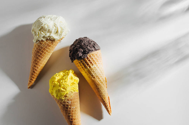Ice cream cones on white background. Summer concept. - Fotoğraf, Görsel
