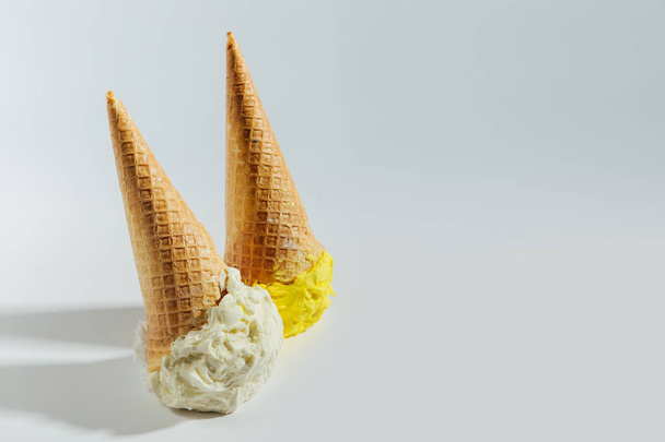 Ice cream cones fallen on white background.  - Photo, Image