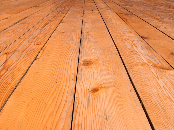 a full frame perspective view of old worn timber planking with a grainy textured surface used for flooring - Photo, Image