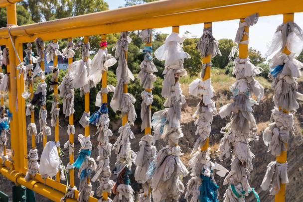 Loving paper and cloth ties on bridge over Corinth Canal near Athens - Photo, Image