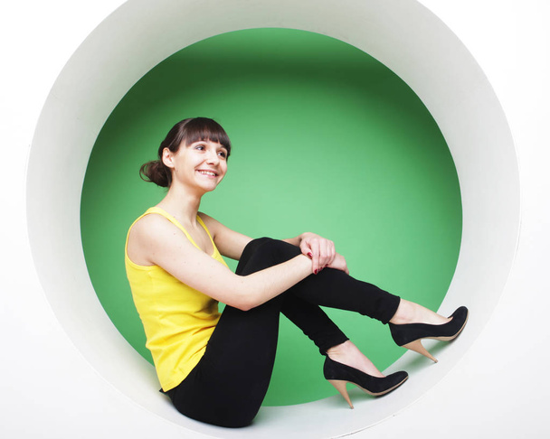 girl posing in green circle - Foto, imagen