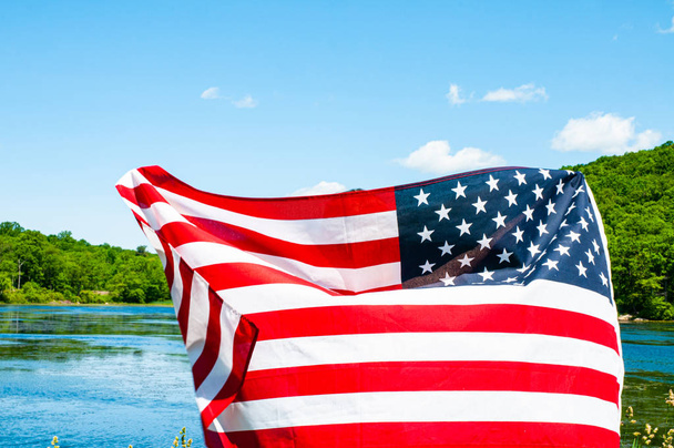 American flag on lake background. United States celebrate Independence Day. 4th of July.  - Foto, Imagen