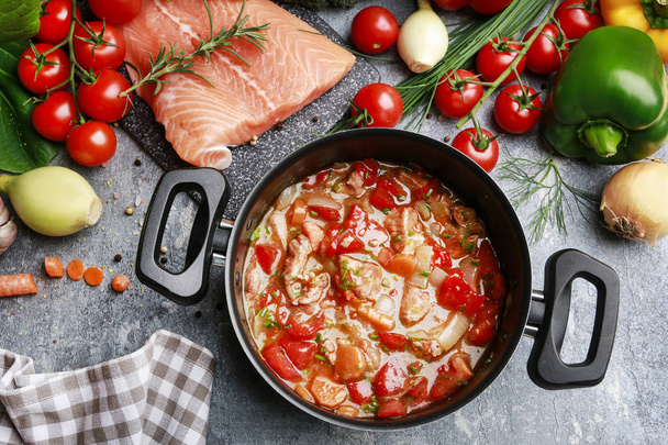 Goulash soup, salmon fillet and colorful vegetables - Fotó, kép