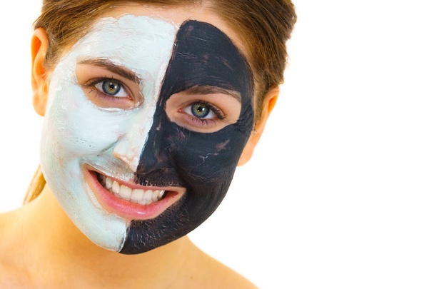 Girl with black white mud mask on face - Foto, Bild