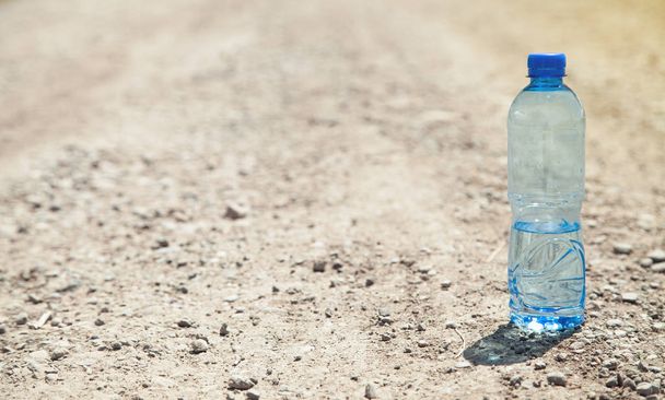 Plastic water bottle in outdoor. - Photo, image