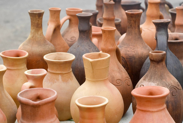 Clay jugs on bargain sale. - Photo, Image