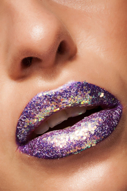 Shot of beautiful girl with purple lipstick and silver glitter - Foto, immagini