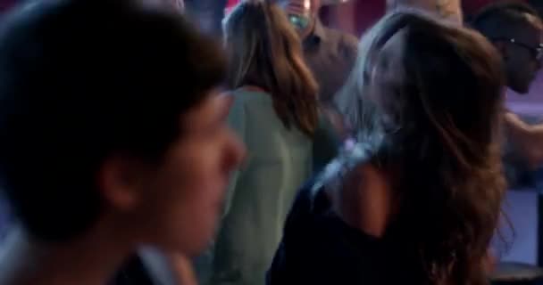 Medium Shot of People Dancing In The Nightclub - Filmati, video