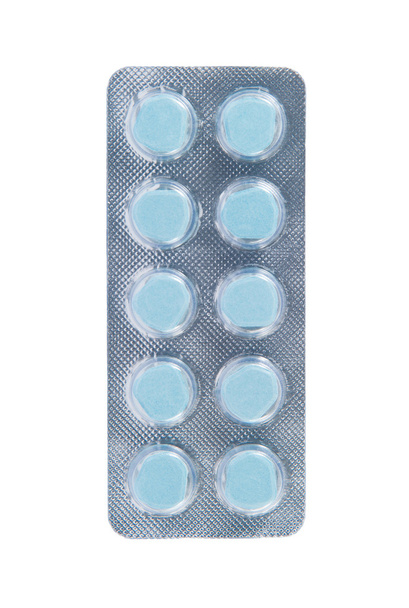 Kék tabletta átlátszó buborékfóliában - Fotó, kép
