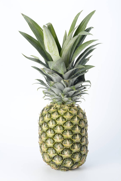 A pineapple, green color - Foto, afbeelding