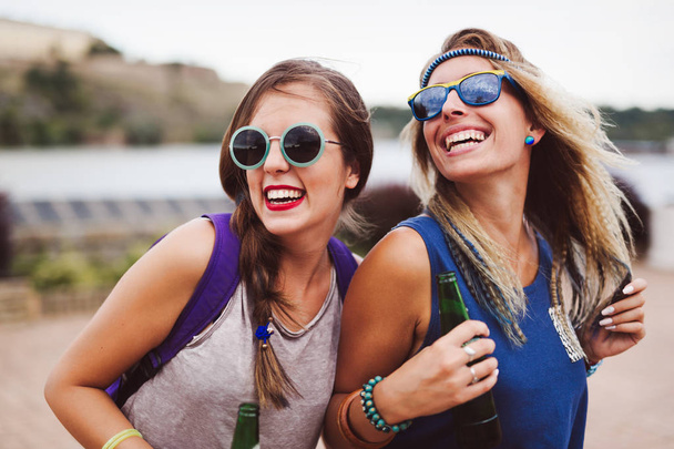 Young pretty happy women having fun time together - 写真・画像