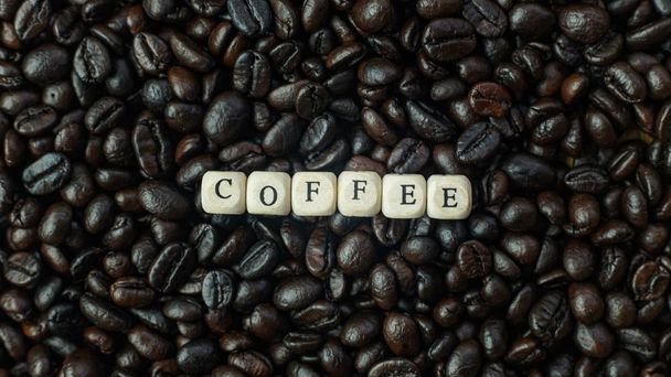 The coffee roasted and text wood cube close up image. - Foto, Imagen