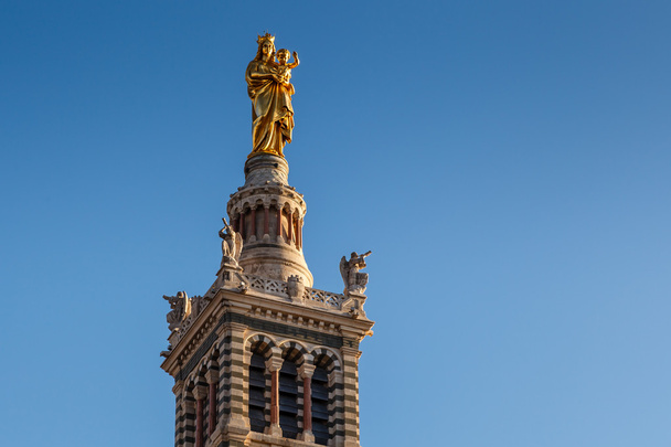 Golden Statue of the Madonna Holding the little Jesus on the top - Valokuva, kuva