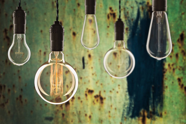 Idea and leadership concept Vintage incandescent Edison bulbs on - Photo, Image
