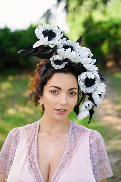 Portrait of young woman wearing gorgeous headdress  - Photo, Image