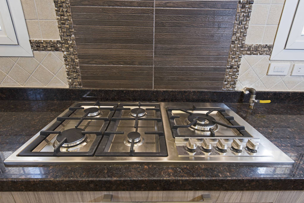 Modern kitchen cooker hob in a luxury apartment - Foto, Imagem