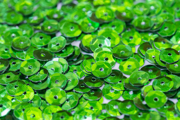 lentejuelas verdes macro fondo
  - Foto, imagen