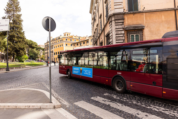 ROME, ITALY - JUNE 28, 2019: crowd of people and transport on street - 写真・画像