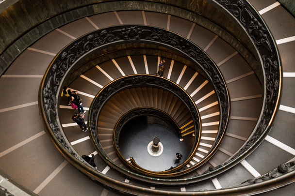 ROME, ITALY - JUNE 28, 2019: overhead view of people on Bramante Staircase in vatican museums - Fotoğraf, Görsel