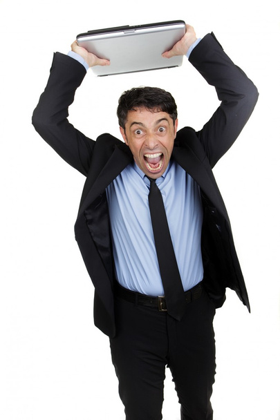 rozzlobený podnikatel házení jeho laptop - Fotografie, Obrázek